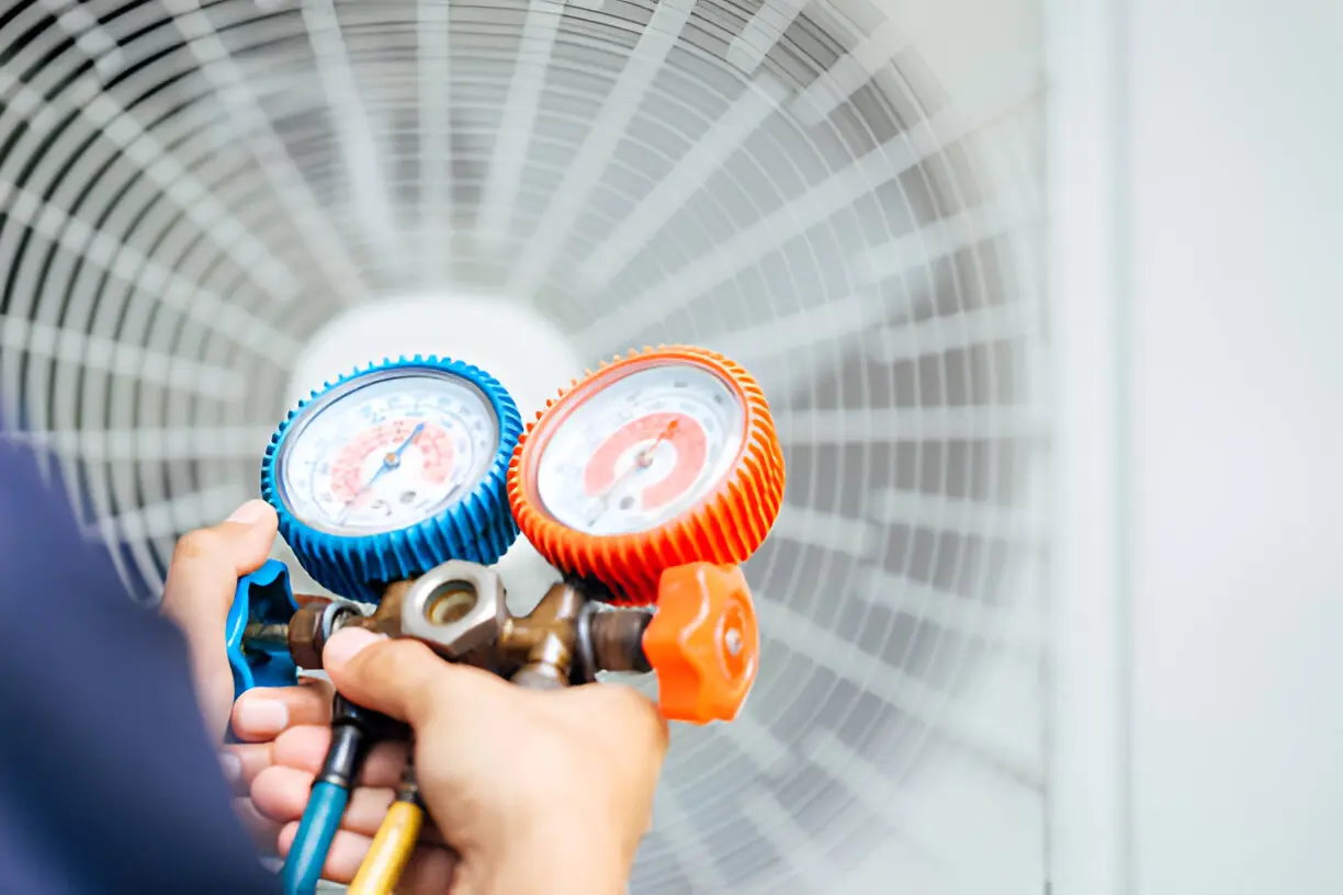 HVAC technician repairing a furnace and ensuring efficient heating during winter in Los Angeles